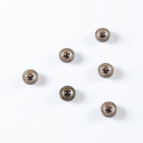 Пуговица с проколами 11 мм пластик 497108  темно-серый